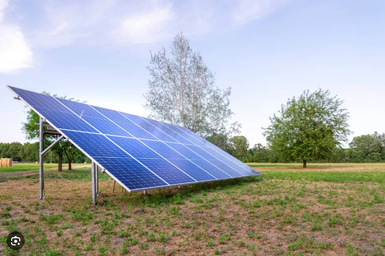 Ground-mounted tilted solar array ready for solar panel cleaning in the North Bay