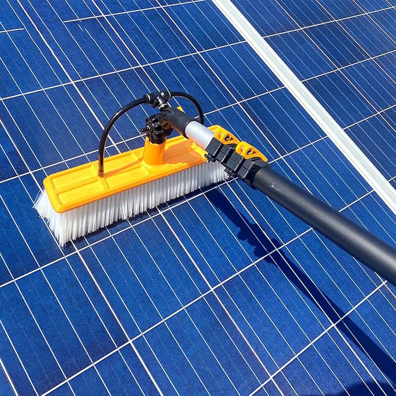 Close-up of a soft-bristle brush cleaning a solar panel during a Vallejo solar panel cleaning