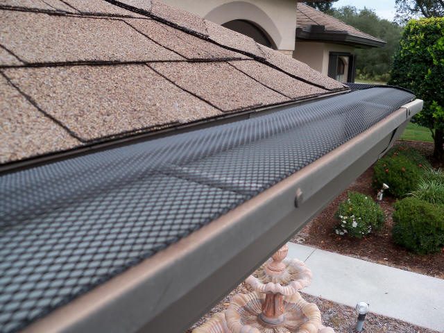 Gutter guard installed along a roofline gutter on a Vallejo home
