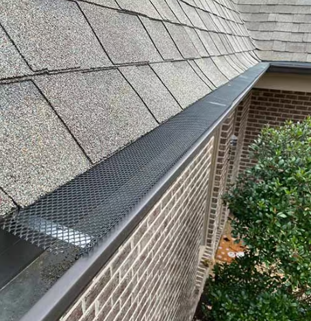 Mesh gutter guards installed along a Napa home's roofline by Perfect Pane
