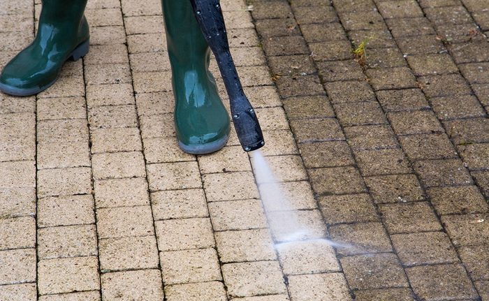 Pressure washing a paver patio in Vallejo